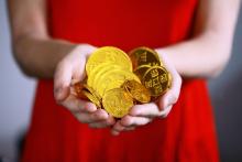 Woman holding coins